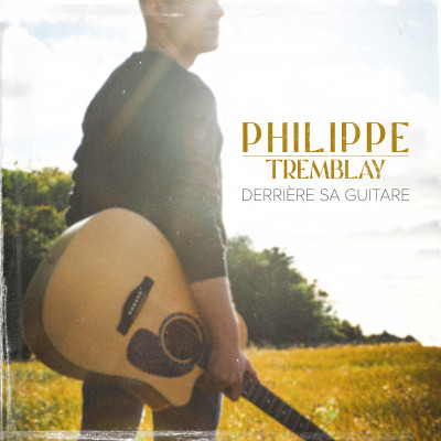 Derrière sa guitare